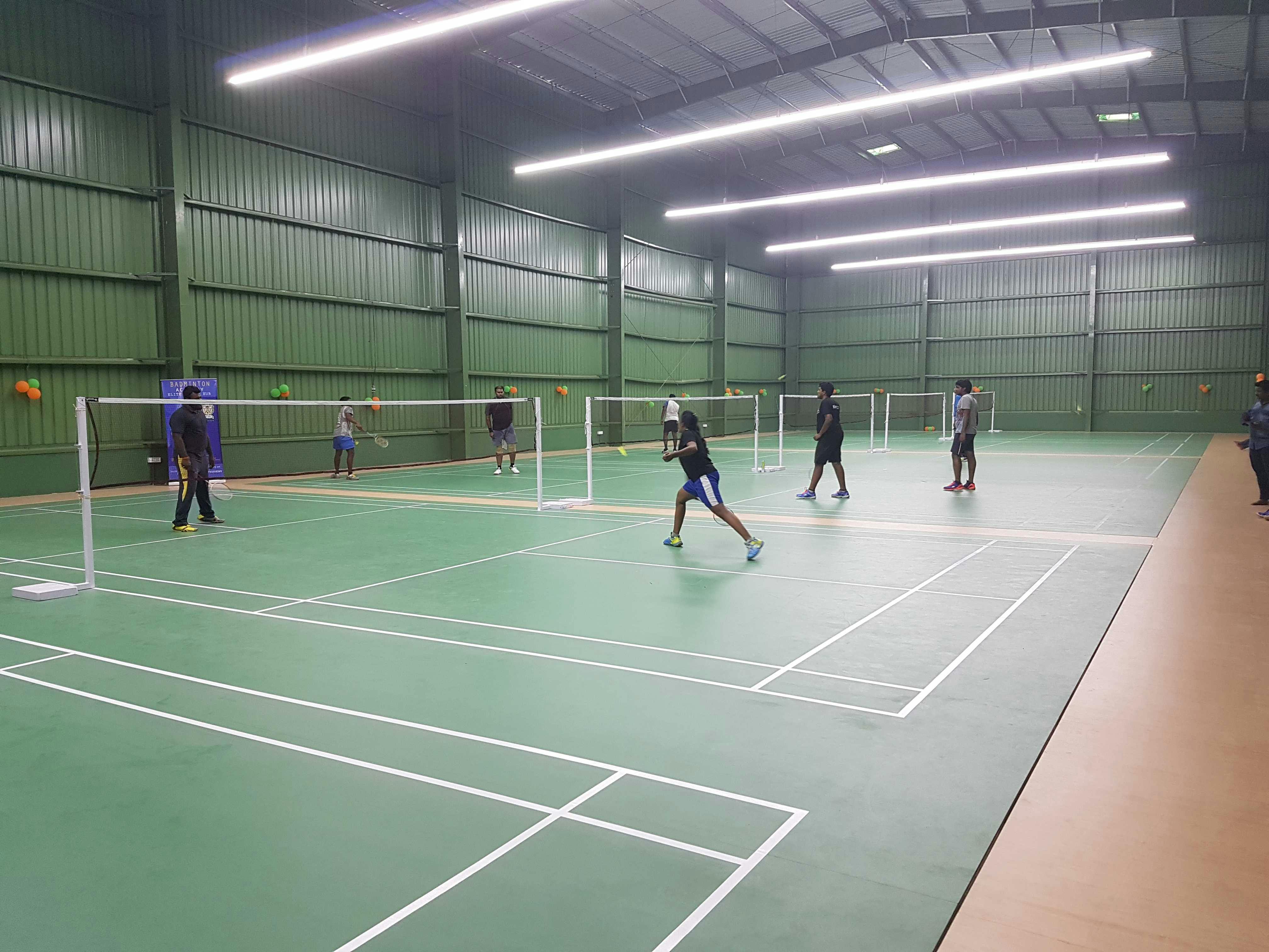 People are playing Badminton in Elite sports hub